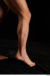 Herbert 1 10years calf flexing nude side view 0006.jpg